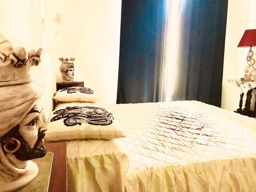 Katil atau katil-katil dalam bilik di B&B dell'orologio