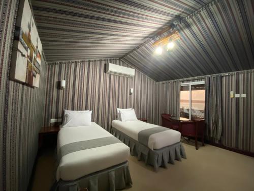 Säng eller sängar i ett rum på Turtle Beach Resort