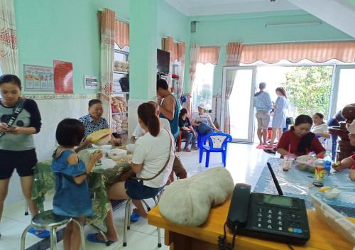 a group of people sitting in a room at Ly Tri Ly Son Hotel in Ly Son