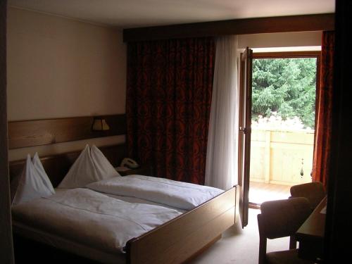 Ένα ή περισσότερα κρεβάτια σε δωμάτιο στο Burgblick