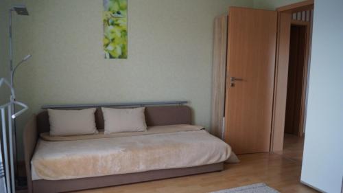 Een bed of bedden in een kamer bij Ferienhaus Familie Müller