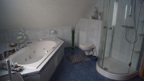 Een badkamer bij Ferienhaus Familie Müller
