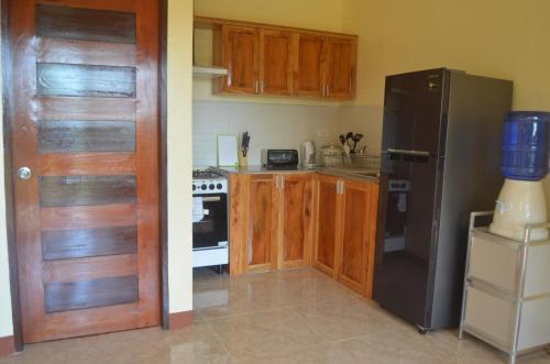 Dapur atau dapur kecil di Villa Alessandra Homestay