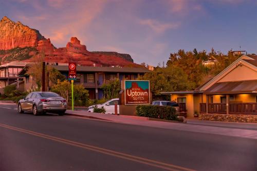 a car driving down a street in front of a hotel at Sedona Uptown Suites in Sedona