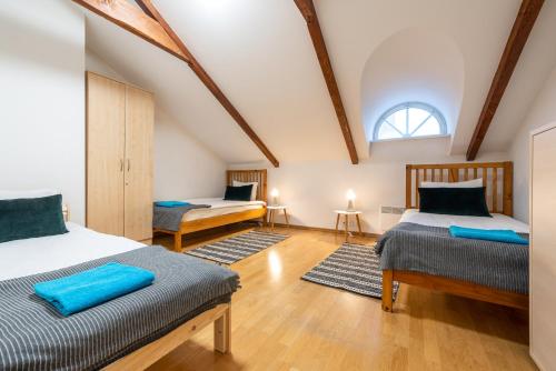 Кровать или кровати в номере Old Town - Vana Viru Apartment