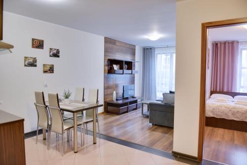 Ένα ή περισσότερα κρεβάτια σε δωμάτιο στο City Aparthotel