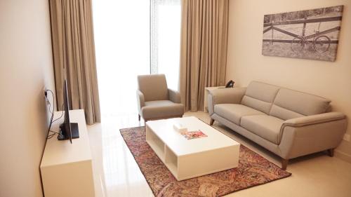Χώρος καθιστικού στο Sunday Luxury Downtown Adliya Formerly Jewel Hotel