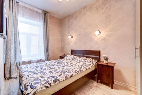
Кровать или кровати в номере апартаменты на Жуковского 6
