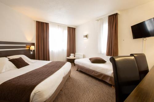 Postel nebo postele na pokoji v ubytování Hotel Chantereyne
