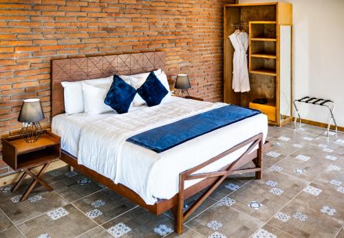 Ένα ή περισσότερα κρεβάτια σε δωμάτιο στο OJO AZUL RESORT