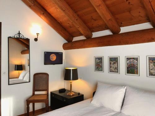 En eller flere senge i et værelse på Tenuta Casa Cima - tenutacasacima com -