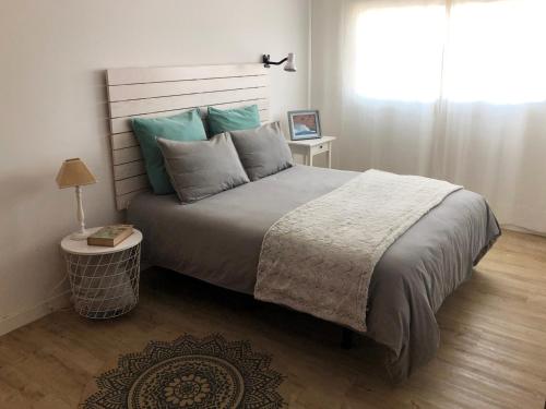 A bed or beds in a room at Casa Capricho