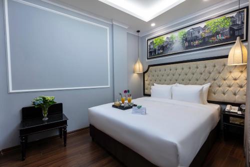 Voodi või voodid majutusasutuse Babylon Premium Hotel & Spa toas