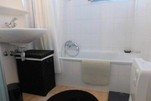 Et badeværelse på Cottage Pelssers@De Haan