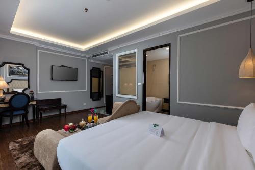 Voodi või voodid majutusasutuse Babylon Premium Hotel & Spa toas