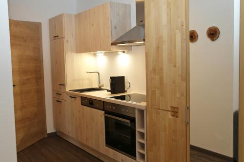 Η κουζίνα ή μικρή κουζίνα στο Apartments Schmiedgut