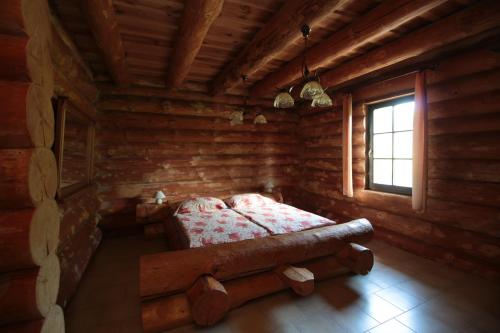מיטה או מיטות בחדר ב-Usedlost Gerstein