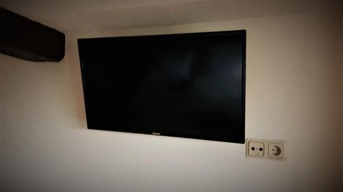 Roastineer Hotelにあるテレビまたはエンターテインメントセンター