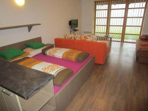 Postel nebo postele na pokoji v ubytování Apartmán Říčky v Orlických Horách