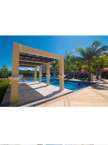 a rendering of a swimming pool at a resort at San Remo Oasis SRP Cebu in Cebu City
