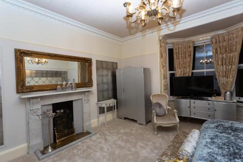 
A television and/or entertainment centre at Trinity Boutique B&B
