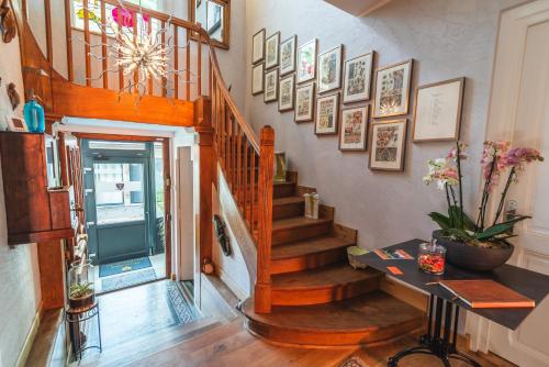 a staircase in a home with a stair case at Domaine du Pressoir in Ambilly