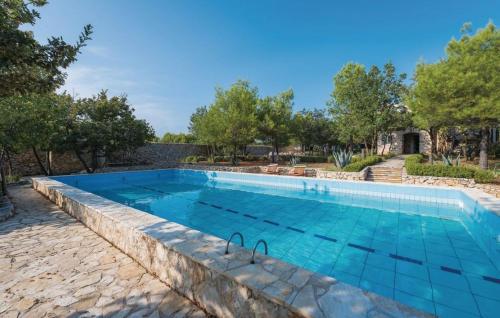 an image of a swimming pool in a house at Ranch Frida in Vodice
