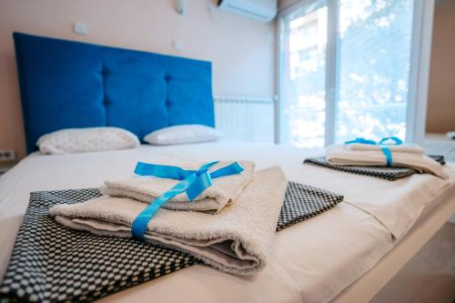 מיטה או מיטות בחדר ב-Turist Apartment