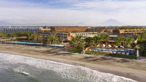 an aerial view of the beach at a resort at Potato Head Suites & Studios in Seminyak