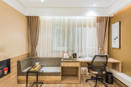 Χώρος καθιστικού στο Atour Hotel Hangzhou West Lake