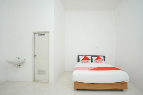 Katil atau katil-katil dalam bilik di Super OYO 2489 Choco 88 Residence