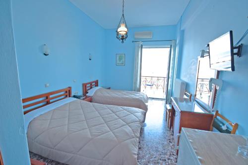 Postel nebo postele na pokoji v ubytování Hotel Blue Sea