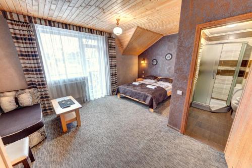 Hotel Gutsuliaにあるベッド