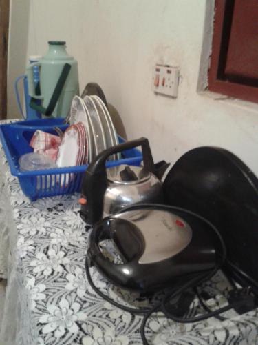 a hair dryer sitting on top of a counter at MOCAP in Kampala