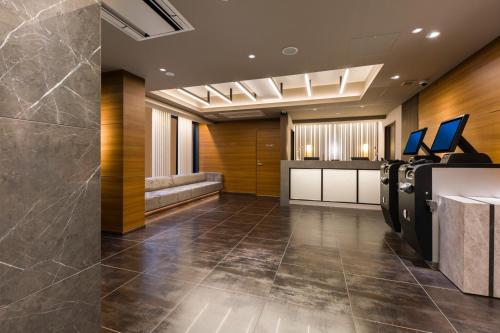 an office with a lobby with a reception desk at IAM HOTEL in Osaka