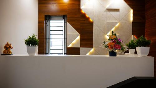 Gambar di galeri bagi The Ventura Grand Hotel di Bangalore