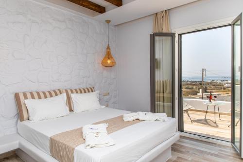 Posteľ alebo postele v izbe v ubytovaní Kallithea Hotel