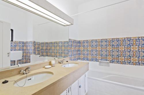 Kylpyhuone majoituspaikassa Prado do Golf