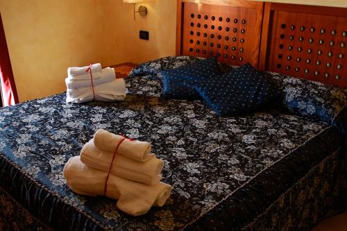 Posteľ alebo postele v izbe v ubytovaní Hotel Ulisse