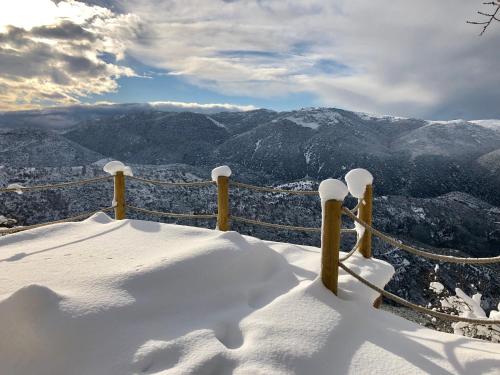 a view from the top of a snow covered mountain at AlmondHouse Suites with Fireplace - ADULTS ONLY in Arachova