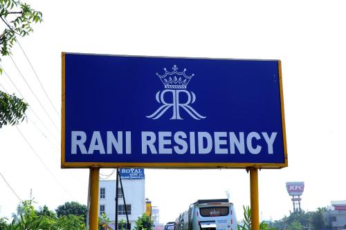 a blue sign for a rmk registration at Rani Residency in Puducherry