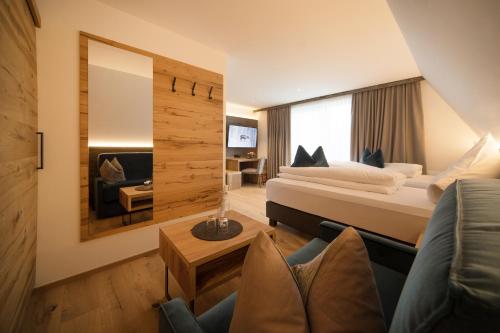 Posteľ alebo postele v izbe v ubytovaní Hotel Stubai