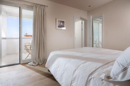 Postel nebo postele na pokoji v ubytování Villa Pia by HMZ Villas