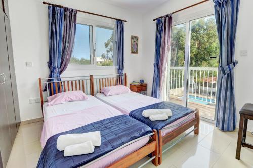 Postel nebo postele na pokoji v ubytování Anasta villa