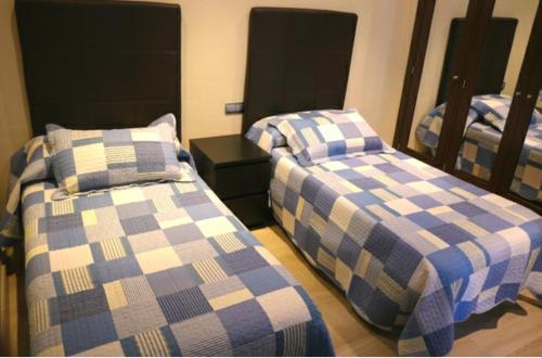 Postel nebo postele na pokoji v ubytování Apartamento de lujo en Estepona