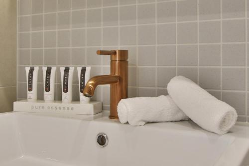 Koupelna v ubytování Domi Serviced Apartments