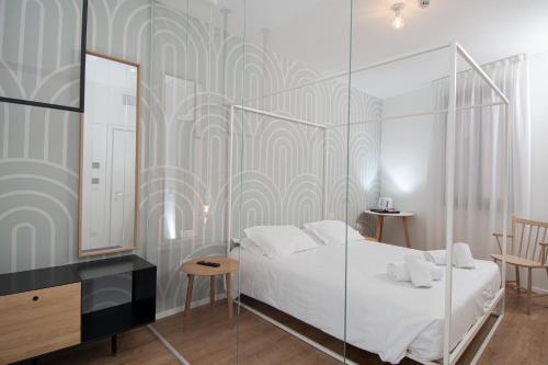 Ένα ή περισσότερα κρεβάτια σε δωμάτιο στο Hotel Rio