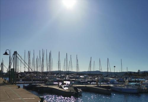 a bunch of boats docked in a harbor at Relax Home in La Caletta