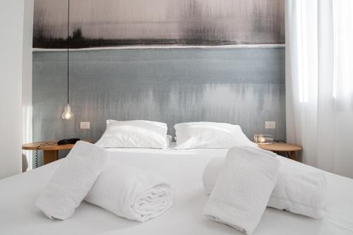 Ένα ή περισσότερα κρεβάτια σε δωμάτιο στο Hotel Rio