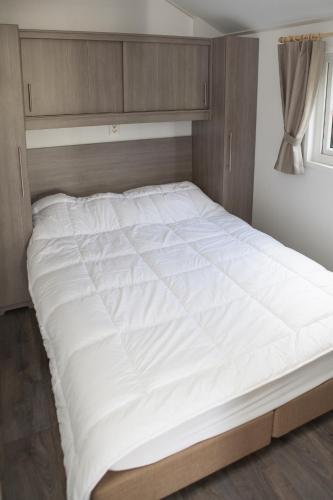 Postel nebo postele na pokoji v ubytování 4+4 pers. Veluwelounge